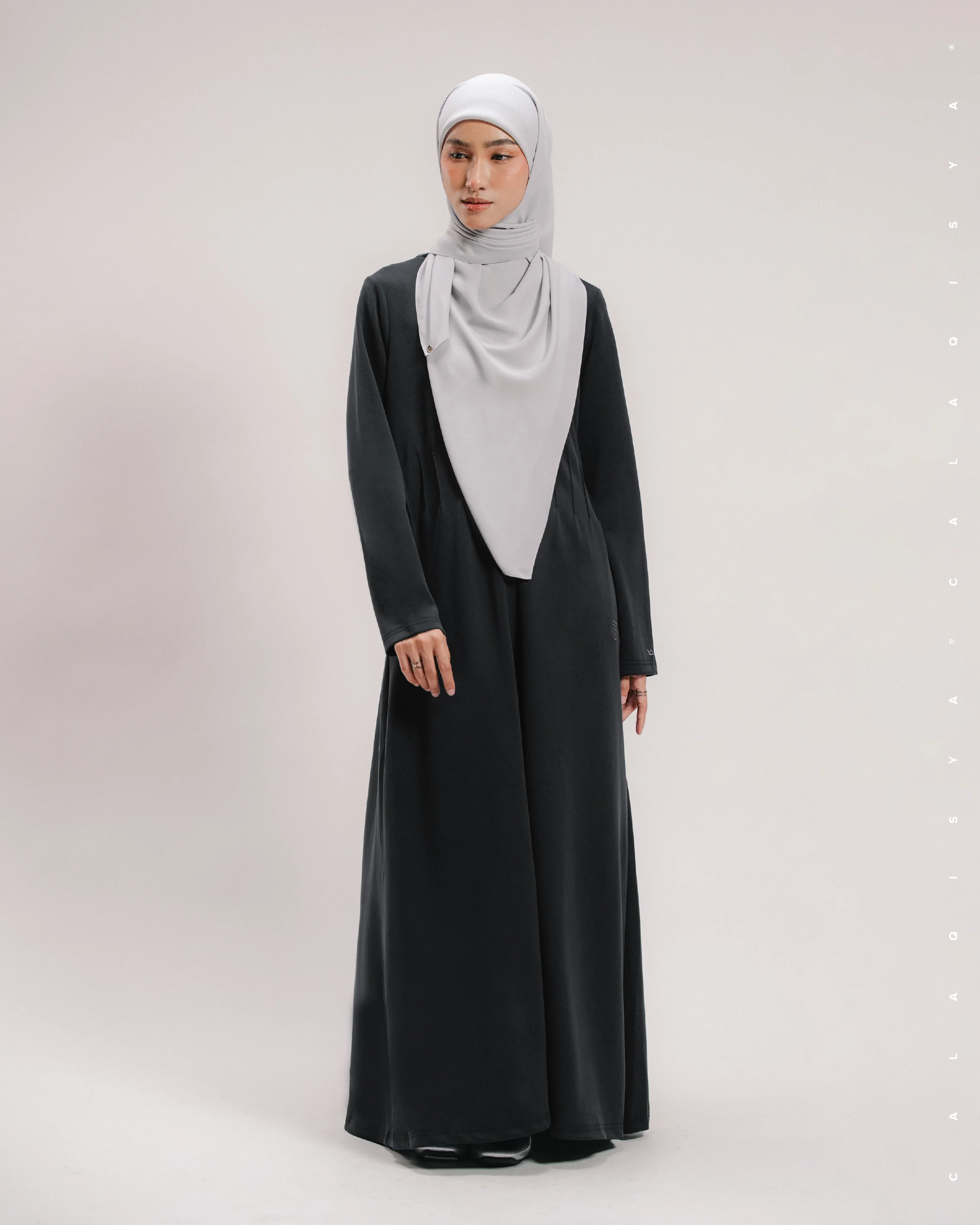 RUSH DOVE PINTUCK DRESS IN BLACK